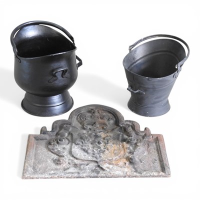 Lot 527 - A cast iron fireback, decorated in relief with...