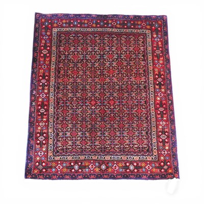Lot 476 - A Persian Senneh rug, with all over designs,...