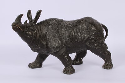 Lot 113 - A bronze model of a rhinoceros, likely 20th...