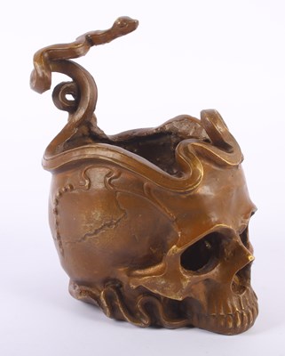 Lot 181 - A bronze bowl in the form of a skull, with...