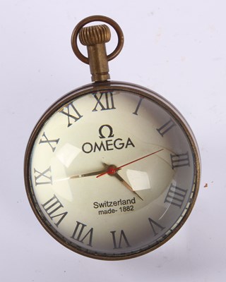 Lot 157 - A brass ball clock