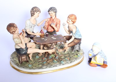 Lot 703 - A Capodimonte figure group, together with a...