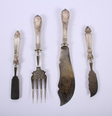 Lot 64 - A continental silver handled fish slice and...