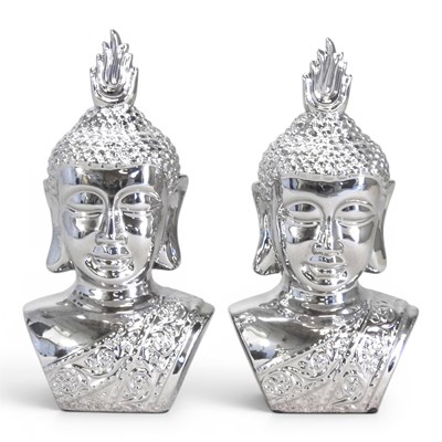 Lot 666 - A pair of silver glazed busts of Buddha, each...