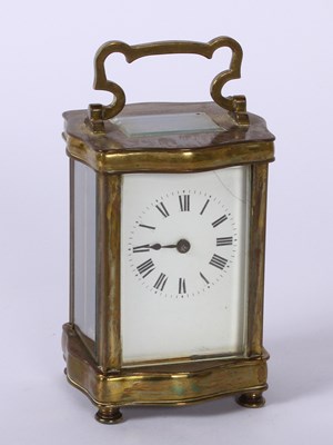 Lot 273 - A brass carriage clock, the enamel dial...