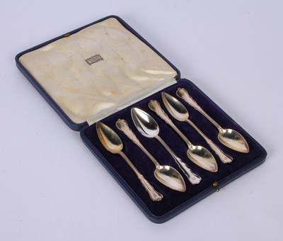 Lot 58 - A set of six George V silver spoons, London...