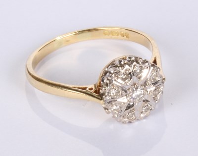 Lot 20 - An 18 carat yellow gold diamond cluster ring,...