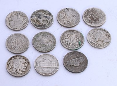 Lot 97 - A collection of eleven five cent coins, dating...