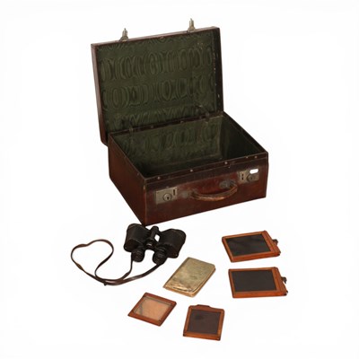 Lot 266 - An early 20th century leather travelling case,...