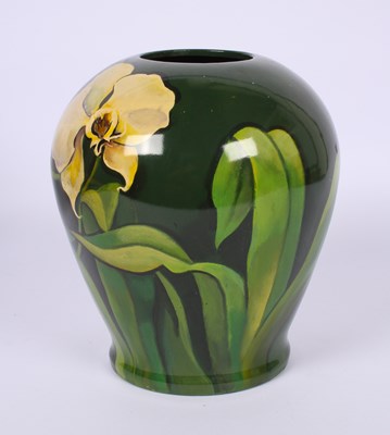 Lot 231 - Yan Typpnambe (b.1932), a green floral pottery...