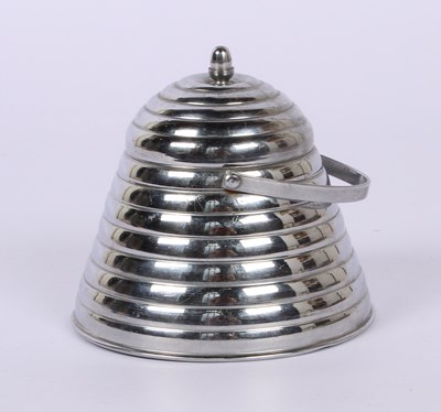 Lot 276 - An Art Deco style metal honey pot, in the form...