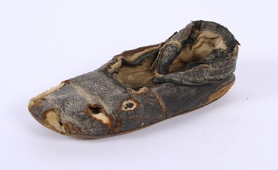 Lot 190 - A 19th century child's leather latchet shoe,...