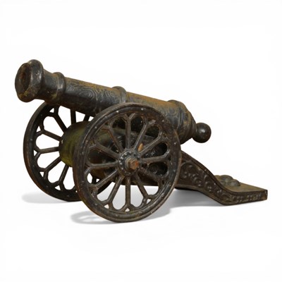 Lot 148 - A cast iron decorative garden cannon, 71x48x31cm