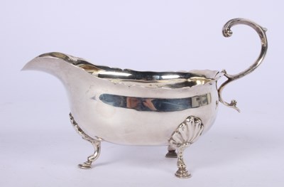 Lot 49 - A Victorian silver helmet shaped sauce boat,...