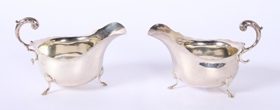 Lot 36 - A pair of George V silver helmet shaped sauce...