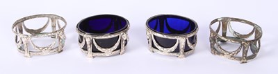 Lot 31 - A set of four George IV silver salts, each...