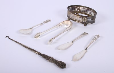 Lot 48 - A collection of silver items comprising a pair...