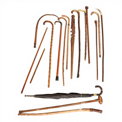 Lot 140 - A collection of vintage walking sticks,...