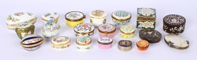 Lot 183 - A collection of porcelain and enamel pill,...