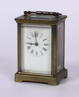 Lot 272 - A brass carriage clock, the enamel dial...