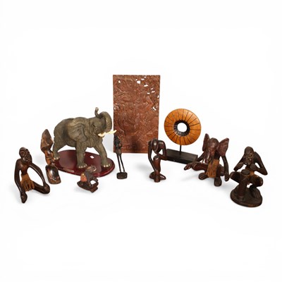 Lot 734 - A collection of African and Eastern wood...