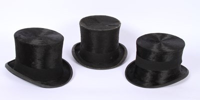Lot 166 - A James Co. top hat, together with others,...