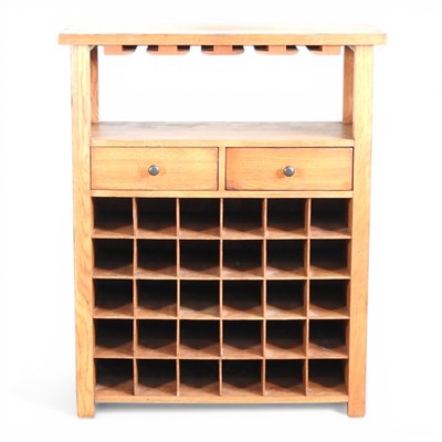 Lot 462 - A modern light oak wine rack, to hold...