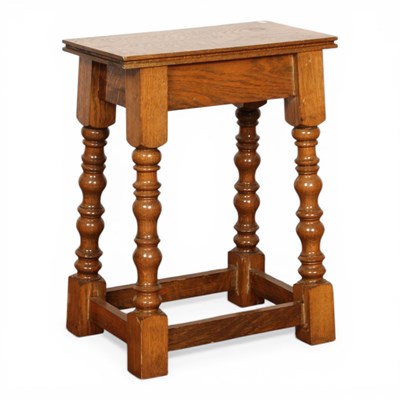 Lot 604 - An oak joint stool