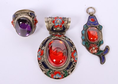 Lot 84 - A collection of three white metal rings and...