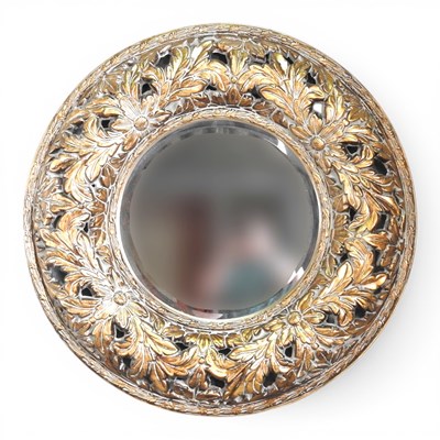 Lot 664 - A large modern circular wall mirror, with a...