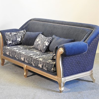 Lot 284 - A modern gilt framed and blue upholstered sofa