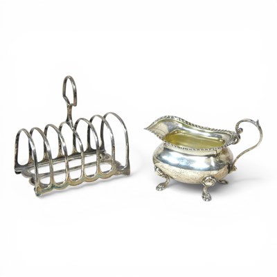 Lot 201 - An early 20th century silver cream jug, of...