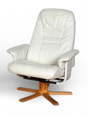 Lot 650A - A Unico cream upholstered swivel arm chair