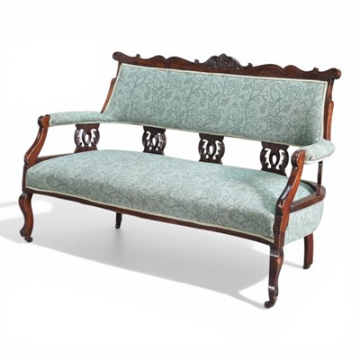 Lot 650 - An Edwardian green upholstered sofa, on...