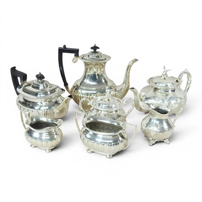 Lot 304 - An early 20th century silver plated four piece...
