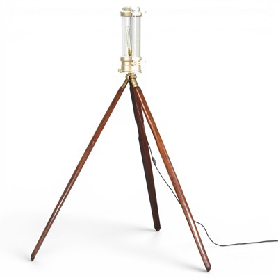 Lot 688 - A tripod standard lamp, adapted from a mid...