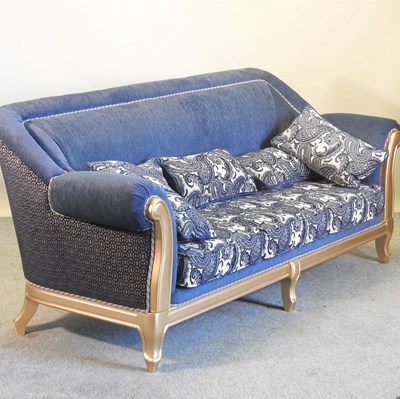 Lot 287 - A gilt framed and blue upholstered sofa