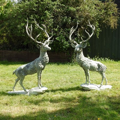 Lot 48 - A pair of life-size weathered bronze garden...