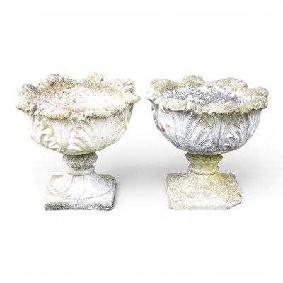 Lot 266 - A pair of cast stone garden urns, of pedestal...