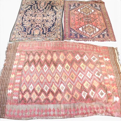Lot 724 - A Turkish kilim rug, with rows of lozenges on...