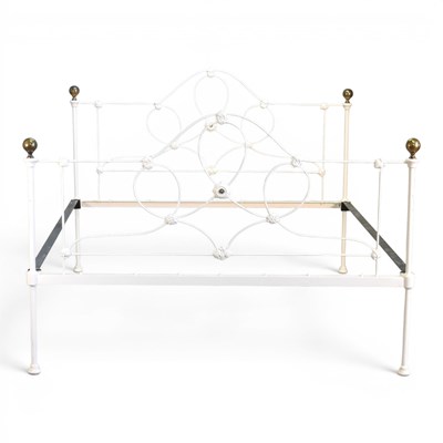 Lot 670 - A Victorian white painted iron double bedstead,...
