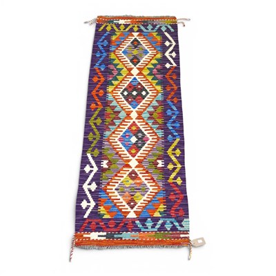 Lot 539 - A Persian kilim rug, with a row of four...