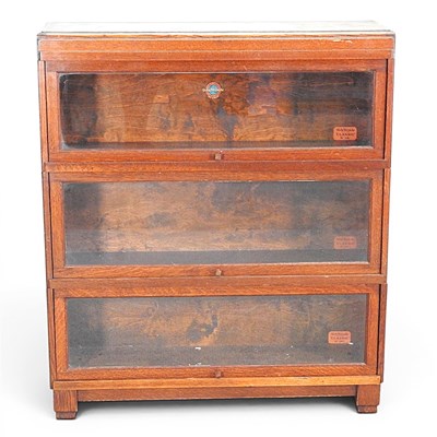 Lot 86 - An early 20th century oak Globe Wernicke...