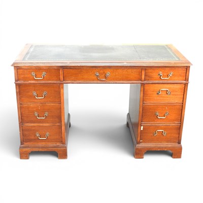Lot 449 - An early 20th century pedestal desk, with an...