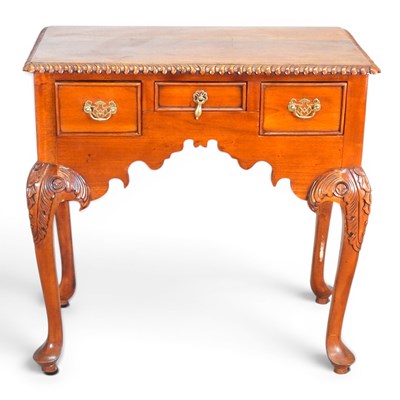 Lot 653 - A modern hardwood Chippendale style lowboy, on...