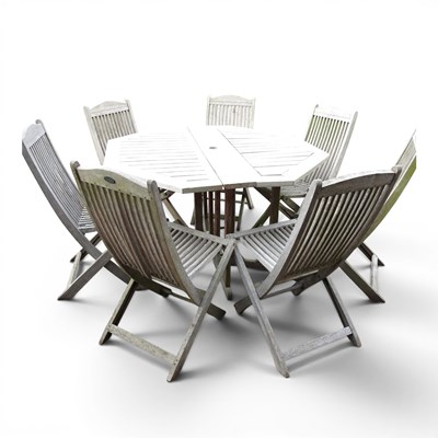 Lot 31 - A Firman teak folding garden table, 121cm wide...