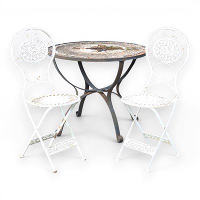 Lot 712 - A metal framed tile top circular garden table,...