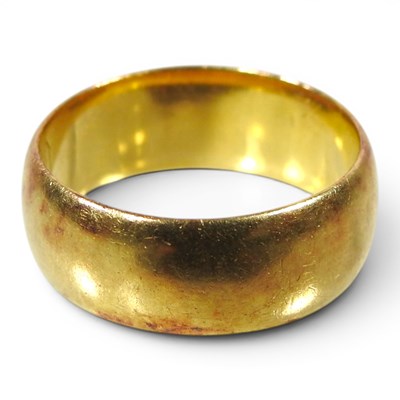 Lot 52 - A 22 carat gold wedding band, of plain design,...
