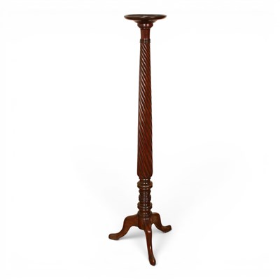 Lot 697 - An Edwardian carved mahogany torchere, h. 143cm.