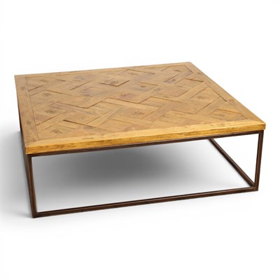 Lot 498 - A large oak square coffee table, on a metal...